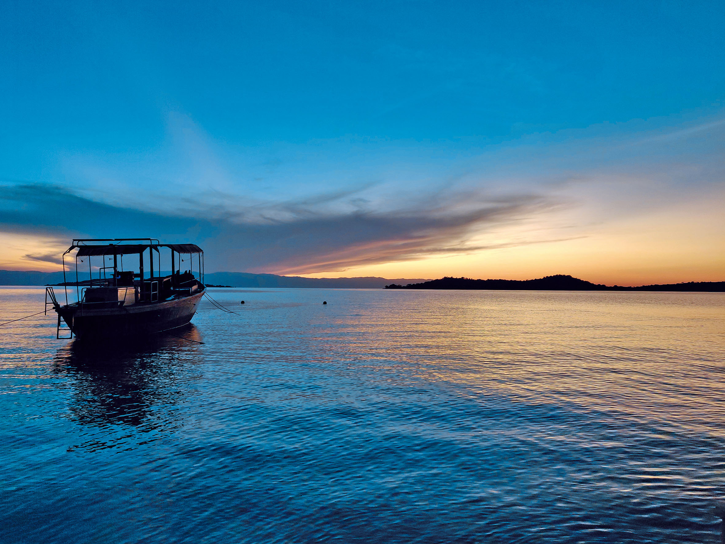 view of tanganyika lake with boat